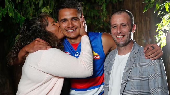 Jamarra Ugle-Hagan with parents Alice and Aaron after being announced as the number 1 pick in the 2020 AFL Draft.