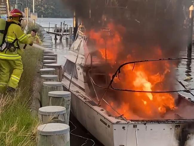 MUST CREDIT Pic: Greg Manning. Facebook video grab. Up to 8 people were  taken to hospital with burns when a 28 foot cruiser exploded into flames at Brooklyn Marina on the Hawkesbury River today. Source: MUST CREDIT Greg Manning. Facebook @ Greg Manning - https://www.facebook.com/greg.manning.792/videos/10220675966073589