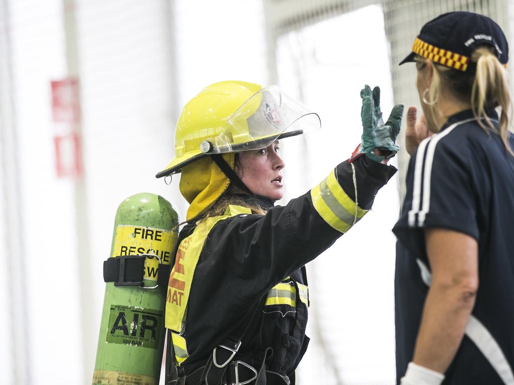 Bronwyn McDougall high fives the trainer on completion of the course. Picture: Dylan Robinson