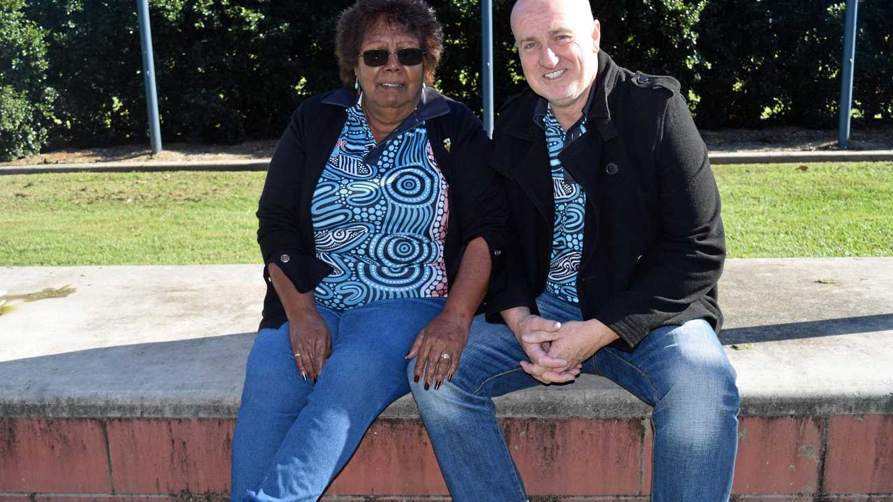 UNITED AS ONE: NAIDOC committee co-chairs Aunty Lillian Burke and Sean Connelly at the fly the flag event in Gympie today. Picture: Philippe Coquerand