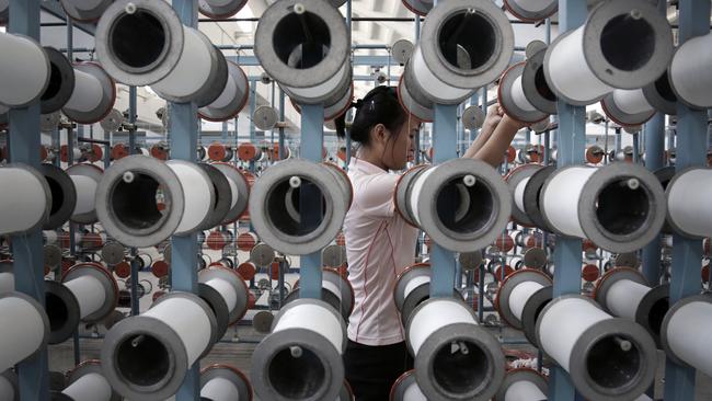 North Korean woman works at the Kim Jong Suk Pyongyang textile factory in Pyongyang, North Korea, 2014. Picture: AP Photo/Wong Maye-E