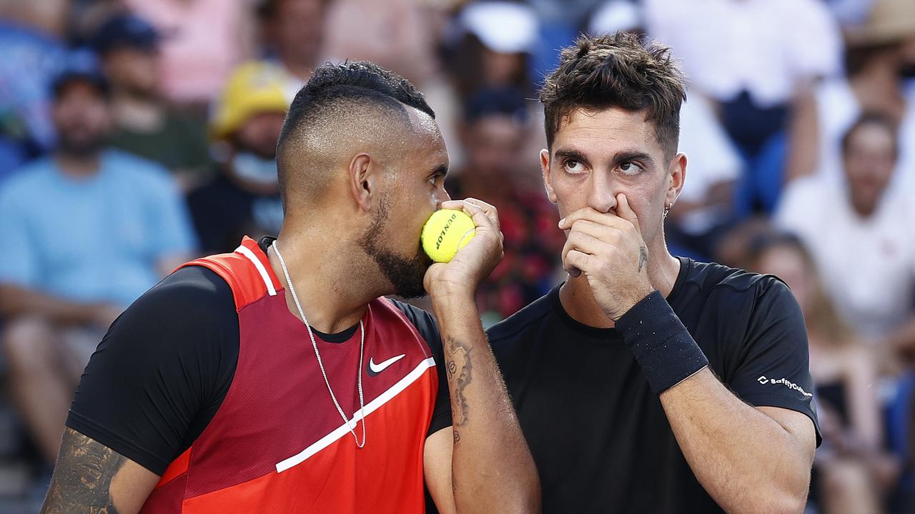 Kyrgios and Thanasi Kokkinakis talk tactics. Picture: Darrian Traynor/Getty Images