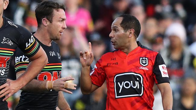 Referee Ashley Klein has words to Penrith's James Maloney. Picture: Brett Costello