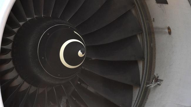 The damaged engine of Air Asia flight D7207 at Brisbane Airport in Brisbane. (AAP Image/Darren England)