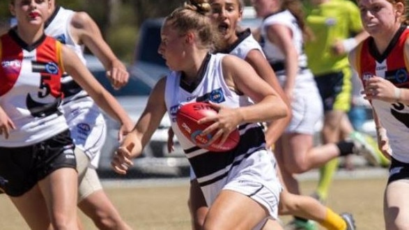 Jess Fitzgerald speeds away from Dandenong opponents. Picture: AFL Victoria