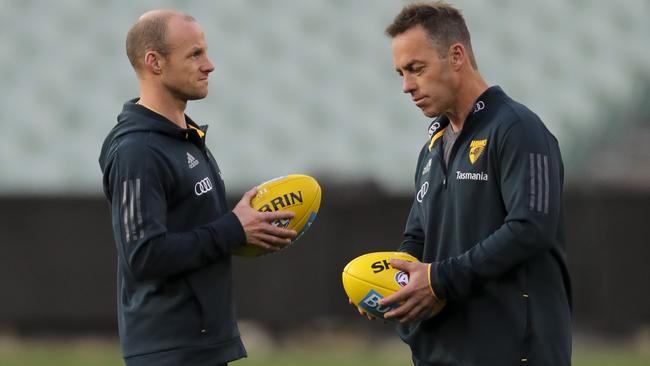 Andrew Russell with Hawthorn coach Alastair Clarkson. Picture: Matt Turner