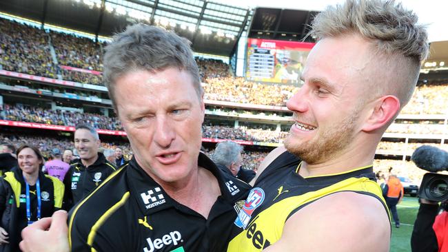 2019 AFL Grand Final. 28/09/2019.  Richmonds Brandon Ellis  hugs coach Damien Hardwick    after the 2019 AFL Grand Final match between the Richmond Tigers and the GWS Giants at the MCG on September 28, 2019 in Melbourne, Australia. Picture: Michael Klein.