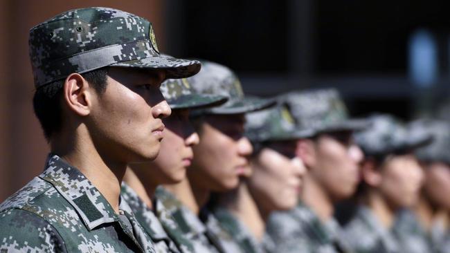 Chinese swimmers line up at the military boot camp. Picture: Weibo