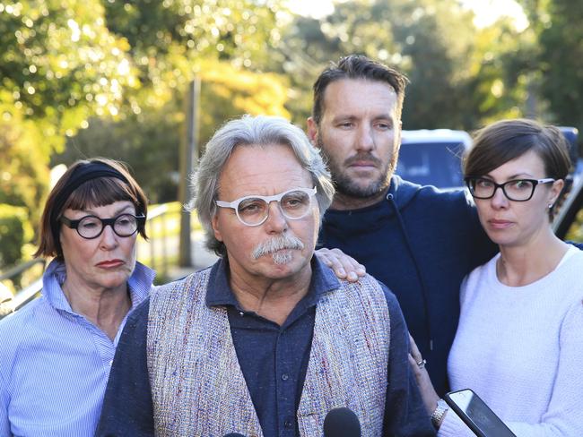 Maryan Herffernan and John Ruszczyk (front), father of Justine Damond, with brother Jason Ruszczyk and Katarina Ruszczyk. Picture: Dylan Robinson