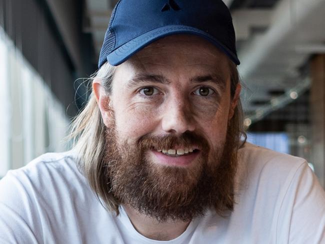 Mike Cannon-Brookes, co-founder and chief executive officer of Atlassian Corp., poses for a photograph in Bengaluru, India, on Wednesday, July 3, 2019. Cannon-Brookes has said the firm will get all its power from renewable sources by 2025. Photographer: Karen Dias/Bloomberg via Getty Images