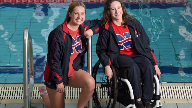 Norwood Swimming Club members Emily White and Izzy Vincent, who is competing at this year’s Tokyo Paralympics. Picture: Naomi Jellicoe