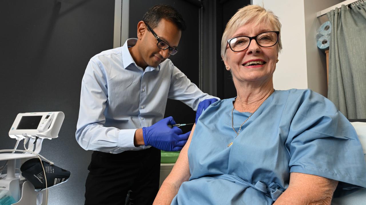 Dr Nischal Sahai and participant Carolyn Rose during a University of Southern QLD clinical trial of an investigational 3-in-1 vaccine of mRNA vaccine for Covid, Flu and RSV. Picture: Lyndon Mechielsen/Courier Mail