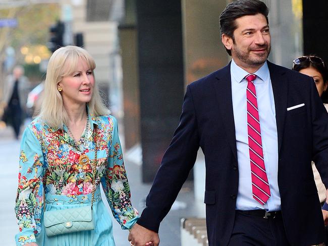 A smiling Constantine Arvanitis arrives at the County Court of Victoria with his fiance Melanie Thornton. Photo: NCA NewsWire / Nicki Connolly