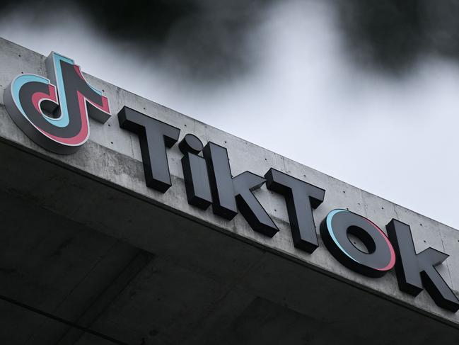 (FILES) The TikTok logo is displayed outside TikTok social media app company offices in Culver City, California, on March 16, 2023. TikTok faces a US ban after an appeals court on December 6, 2024, rejected its challenge to a law requiring the video-sharing app to divest from its Chinese parent company by January 19. The potential ban could strain US-China relations just as president-elect Donald Trump prepares to take office on January 20. (Photo by Patrick T. Fallon / AFP)