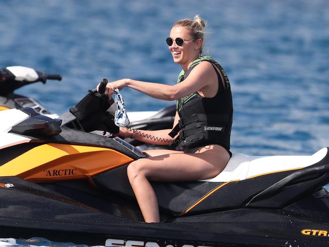 Jasmine takes one of the jet skis for a spin. Picture: BackGrid