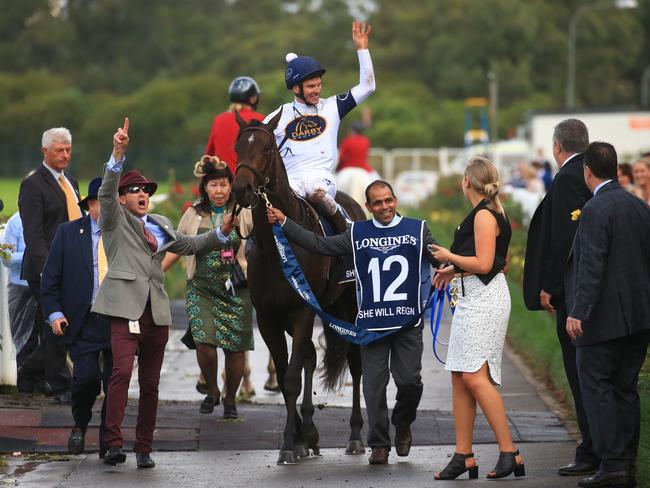 Jockey Ben Melham and She Will Reign return to scale victorious. Picture: Adam Taylor