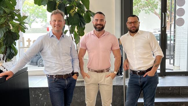 Mark Foy, director of McGrath Surry Hills (in blue shirt) with sales agents Wes Smuts (pink shirt) and Dave Ashby (white shirt) - for Careers