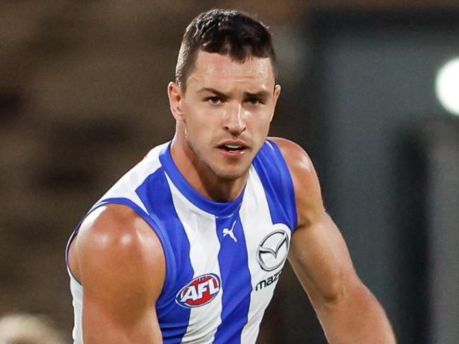 ADELAIDE, AUSTRALIA - APRIL 05: Luke Davies-Uniacke of the Kangaroos in action during the 2024 AFL Round 04 match between the Brisbane Lions and the North Melbourne Kangaroos at Norwood Oval on April 05, 2024 in Adelaide, Australia. (Photo by Dylan Burns/AFL Photos via Getty Images)