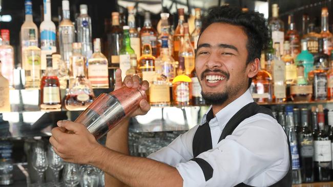 Bartender Parramatta Diwas Gadtaula before the coronavirus hit businesses really hard. Picture: Angelo Velardo