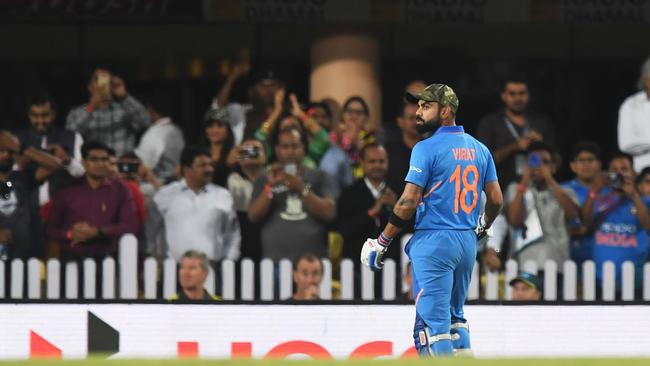 Indian cricket captain Virat Kohli looks on as he walks back after losing his wicket. Picture: Dibyangshu Sarkar/AFP