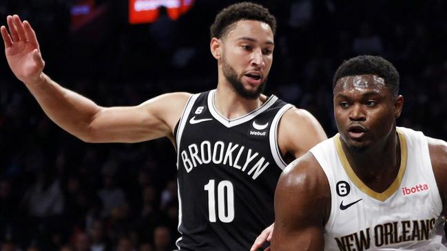 NEW YORK, NEW YORK - OCTOBER 19: Zion Williamson #1 of the New Orleans Pelicans dribbles against Ben Simmons #10 of the Brooklyn Nets during the first half at Barclays Center on October 19, 2022 in the Brooklyn borough of New York City. NOTE TO USER: User expressly acknowledges and agrees that, by downloading and or using this photograph, User is consenting to the terms and conditions of the Getty Images License Agreement. (Photo by Sarah Stier/Getty Images)