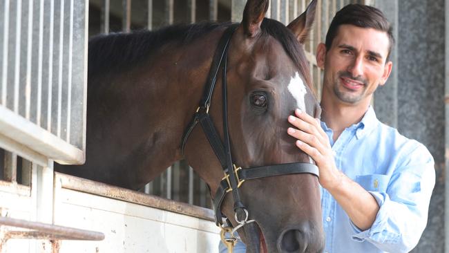 Michael Costa at his Gold Coast stable with Malahide last year. Picture Glenn Hampson