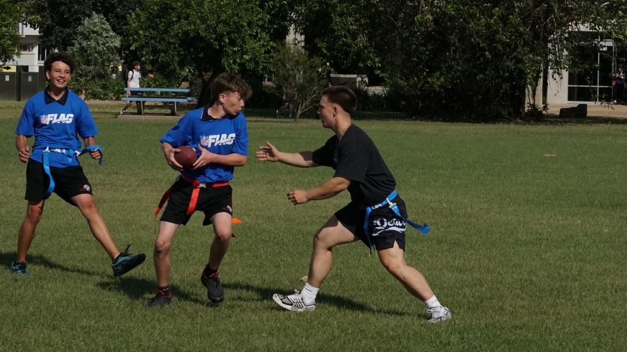 Darwin Middle School students playing Flag Football against United States Marines at DMS, 19 May 2025. Picture: Jason McIntosh