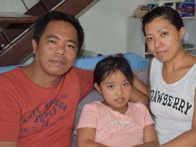 The family of Eimeo fatal box jellyfish sting victim Mark Angelo Ligmayo. Father Nick Guinumtad, mother Agnes Guinumtad and sister Nickole Guinumtad. Picture: Lillian Watkins