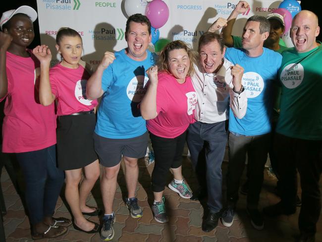 Paul Pisasale (third from right) celebrates his re-election as mayor in November 2016 with daughter Lisa (fourth from left), son James (second from right) and other supporters.