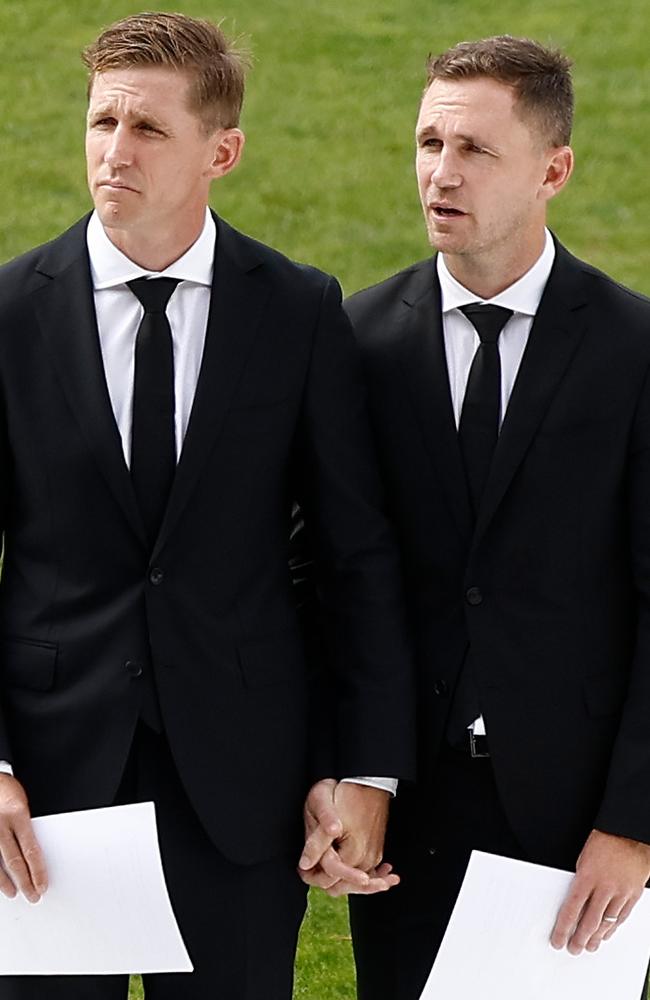 Scott Selwood and Joel Selwood look on during Troy Selwood's funeral service in Geelong.