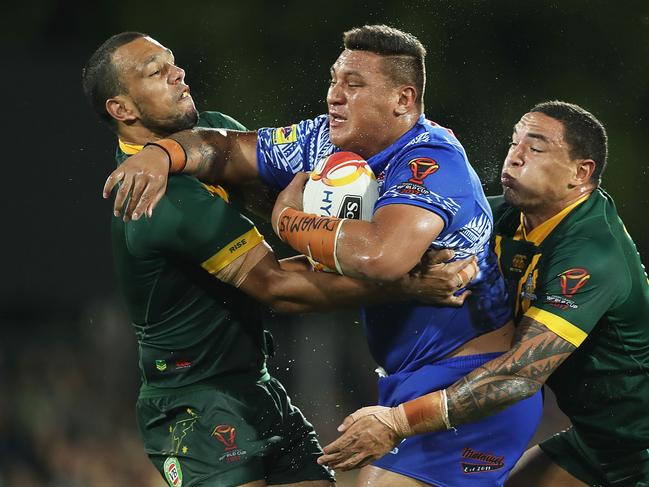 DARWIN, AUSTRALIA - NOVEMBER 17:  Josh Papali of Samoa is tackled during the 2017 Rugby League World Cup Quarter Final match between Australia and Samoa at Darwin Stadium on November 17, 2017 in Darwin, Australia.  (Photo by Mark Metcalfe/Getty Images)