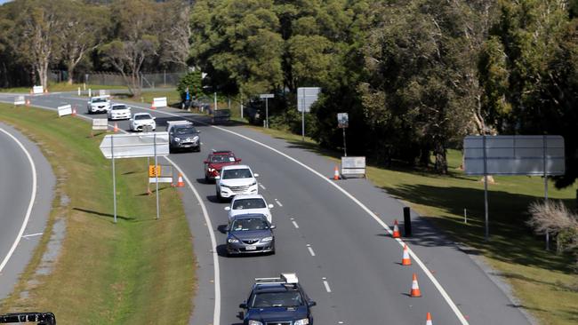 Police remain at border closures in Coolangatta. Picture: Adam Head