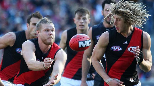 Essendon's Michael Hurley and Dyson Heppell. Picture: George Salpigtidis