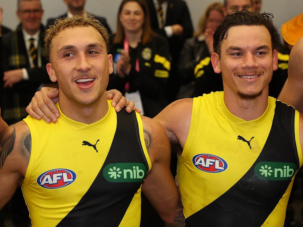 PERTH, AUSTRALIA – JUNE 10: Marlion Pickett, Shai Bolton and Daniel Rioli of the Tigers sing their club song after winning the round 13 AFL match between Fremantle Dockers and Richmond Tigers at Optus Stadium, on June 10, 2023, in Perth, Australia. (Photo by Paul Kane/Getty Images)