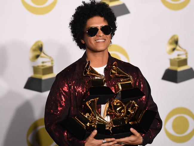 Bruno Mars with his Grammy’s for album <i>24k Magic</i>. Picture: AFP