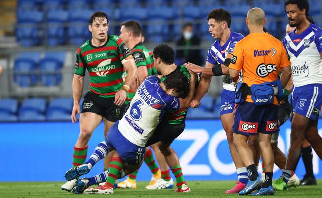 Cody Walker thrown to the ground by Lachlan Lewis (Photo by Chris Hyde/Getty Images)