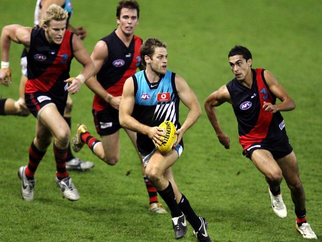 Josh Mahoney plays for Port Adelaide against Essendon.