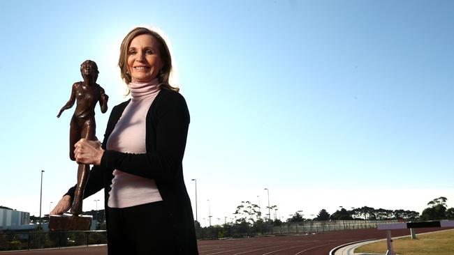 Debbie Flintoff King with a small version of her proposed statue in Mornington. Picture: Hamish Blair