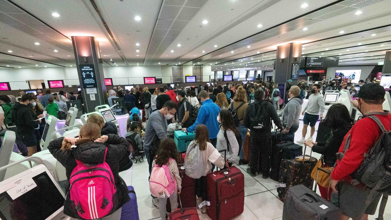 Chaotic scenes at Melbourne Airport‘s Terminal 3 on Sunday morning. Picture: Tony Gough