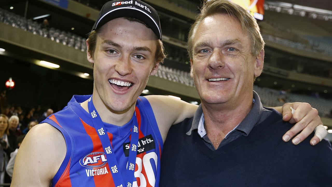 Darcy and Peter Moore after Oakleigh Chargers won the TAC Cup Grand Final.