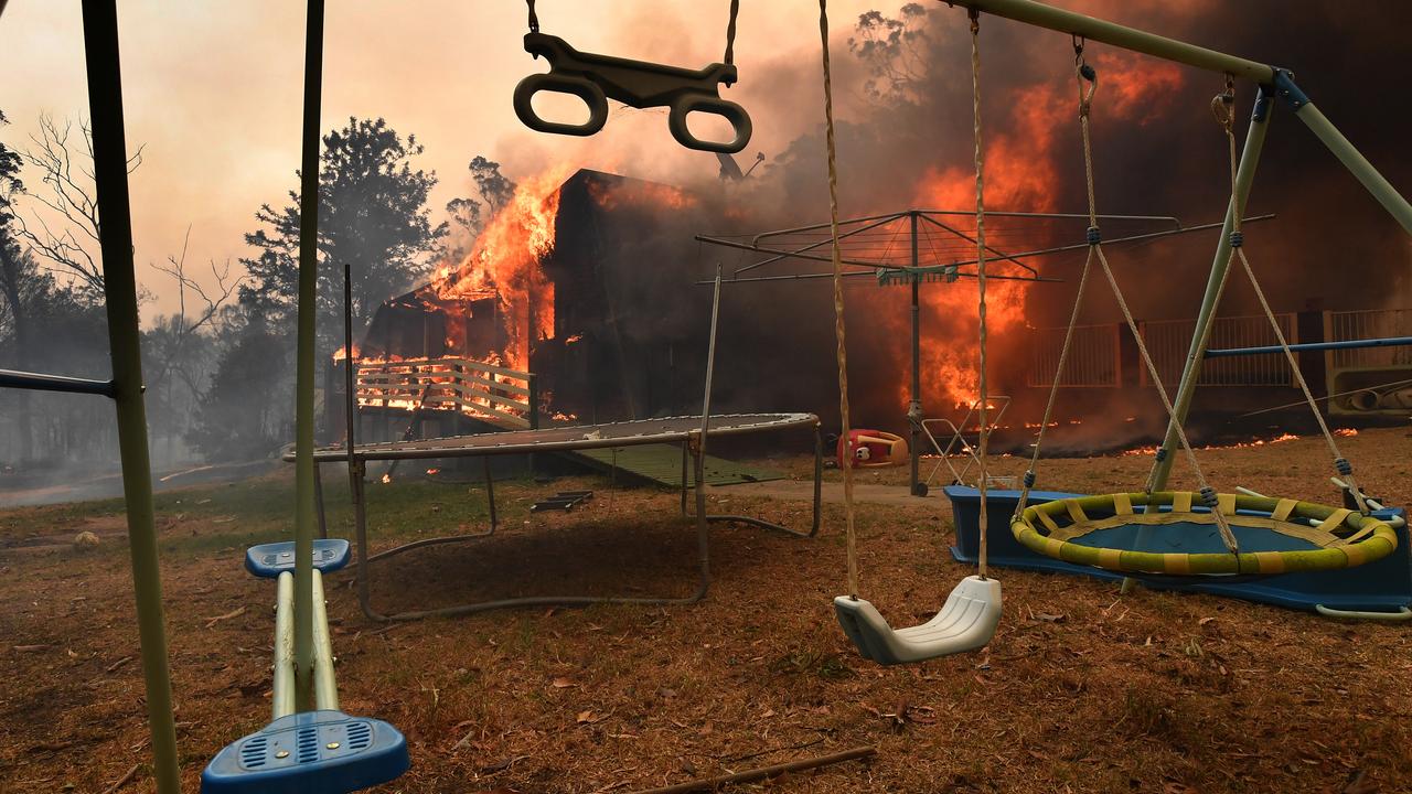 Temperatures in the 40s and high north westerly winds under extreme fire conditions are fanning a number of fires around Sydney. Picture: AAP Image/Dean Lewins