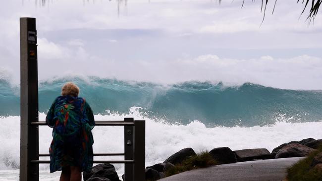 Large surf is seen on the Gold Coast, Thursday, February 21, 2019. Huge swells and high tides are set to pummelling south-east Queensland and far-northern New South Wales beaches over the coming days as Cyclone Oma tracks towards the Queensland coast. (AAP Image/Dave Hunt) NO ARCHIVING