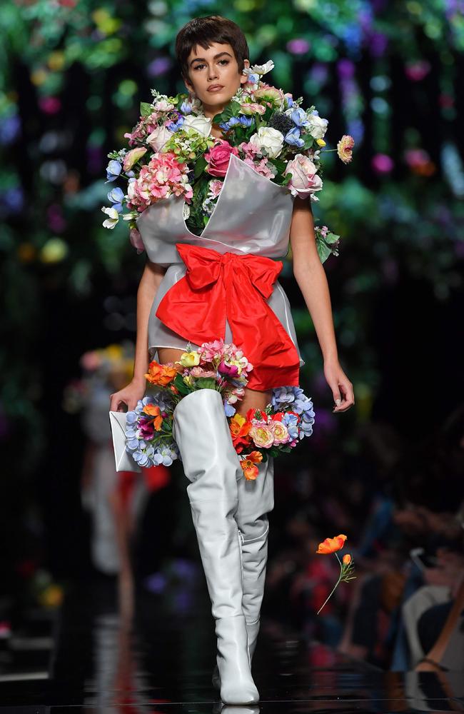 Jeremy Scotts collection for Moschino included a bouquet of looks inspired by flowers, from an orchid to a floral bouquet to a bunch of roses. Picture: AFP