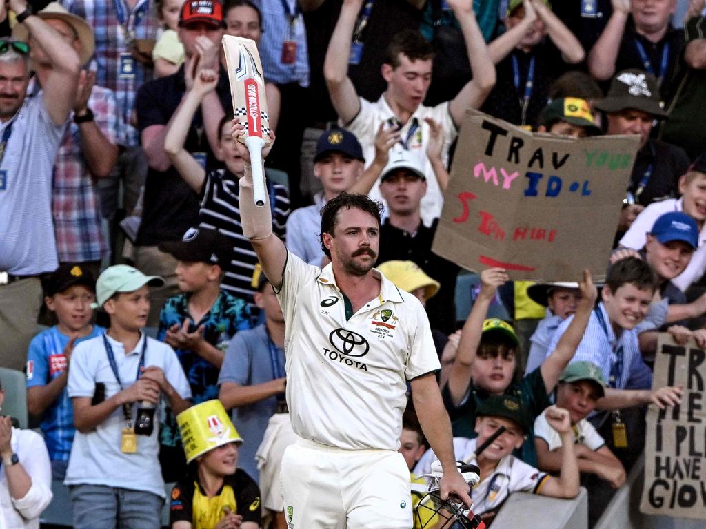 Travis Head acknowledges the applause after being dismissed for 140 in the second Test between Australia and India at Adelaide Oval on December 7. Picture: William West/AFP