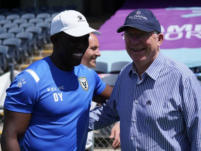 Then Macarthur FC coach Dwight Yorke (left) chats with his former Manchester United manager Sir Alex Ferguson at a Bulls training session in October 2022. Picture: Supplied