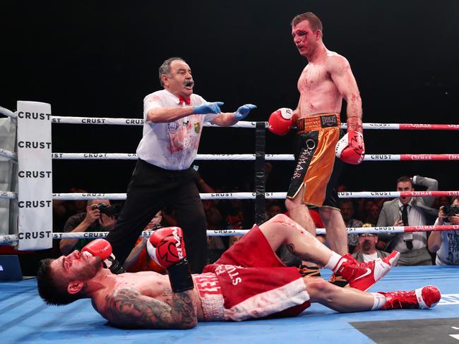 Jeff Horn knocks down Michael Zerafa during their middleweight bout at the Brisbane Convention and Exhibition Centre. (Photo by Chris Hyde/Getty Images)