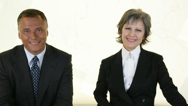 TV presenter journalist Stan Grant with Mary Kostakidis from news program ‘SBS World News bulletin; on January 16, 2007.