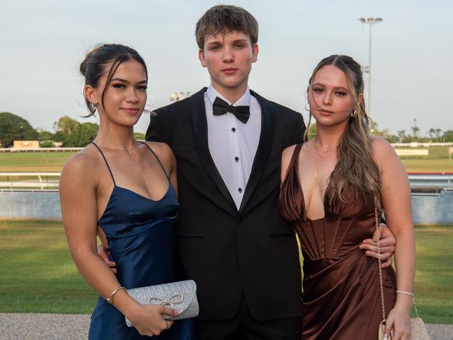 Chelsea Gass, Rebecca Hyde and Brodie Chatterton at the Taminmin College Year 12 School formal at Darwin Turf Club, 2024. Picture: Pema Tamang Pakhrin