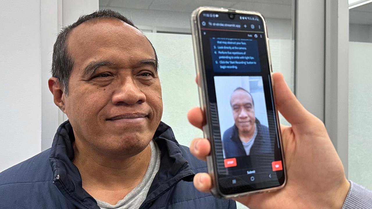 PhD scholar Guilherme Camargo de Oliveira demonstrates the face screening tool with Visiting Associate Professor Nemuel Daniel Pah (left) from RMIT University. Picture: Seamus Daniel, RMIT University