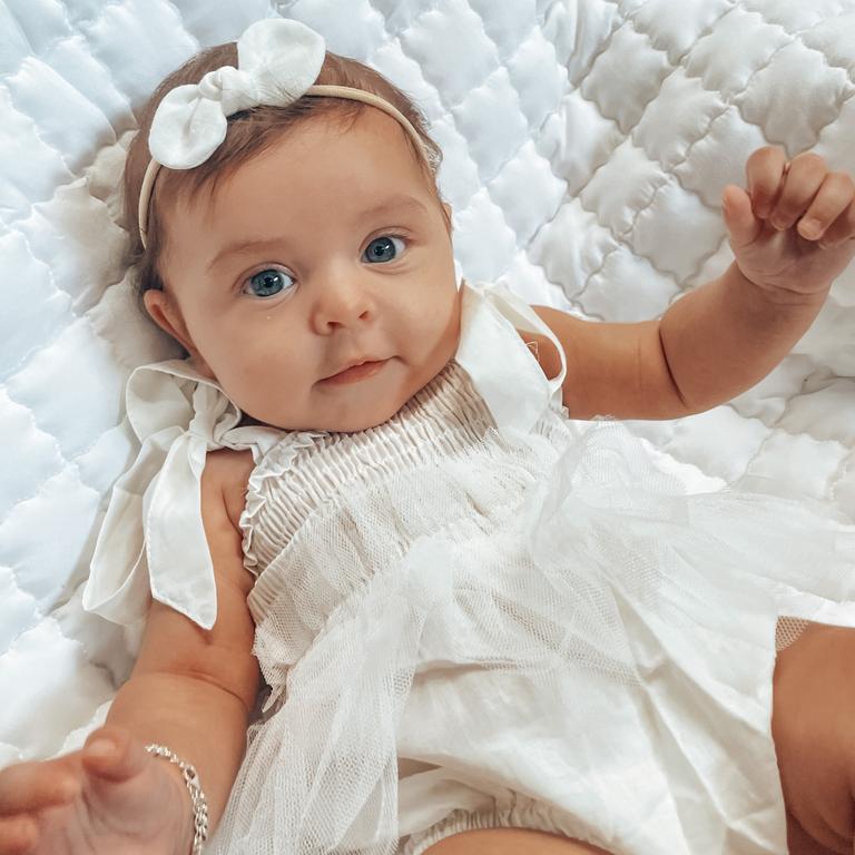 Lahana Stedman, of Maningrida, at three months old. Just look at those welcoming arms! Picture: Emily Pettersson